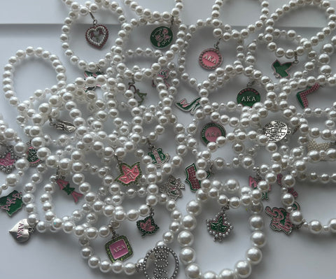 10 Assorted AKA Charm Pearl Bracelets