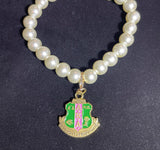Gold AKA Shield Charm Bracelet